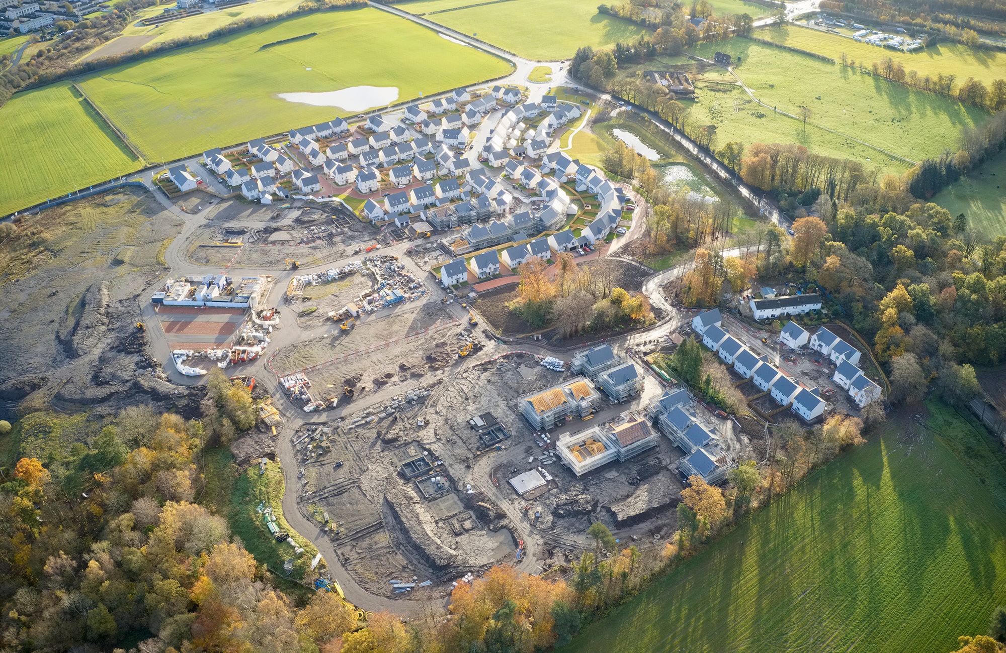 Aerial view of a modern housing estate being built in winter